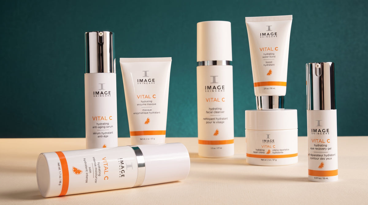IMAGE Skincare Vital C range of vitamin C serums, moisturiser, cleanser, masque and eye gel, displayed against a dark teal background.
